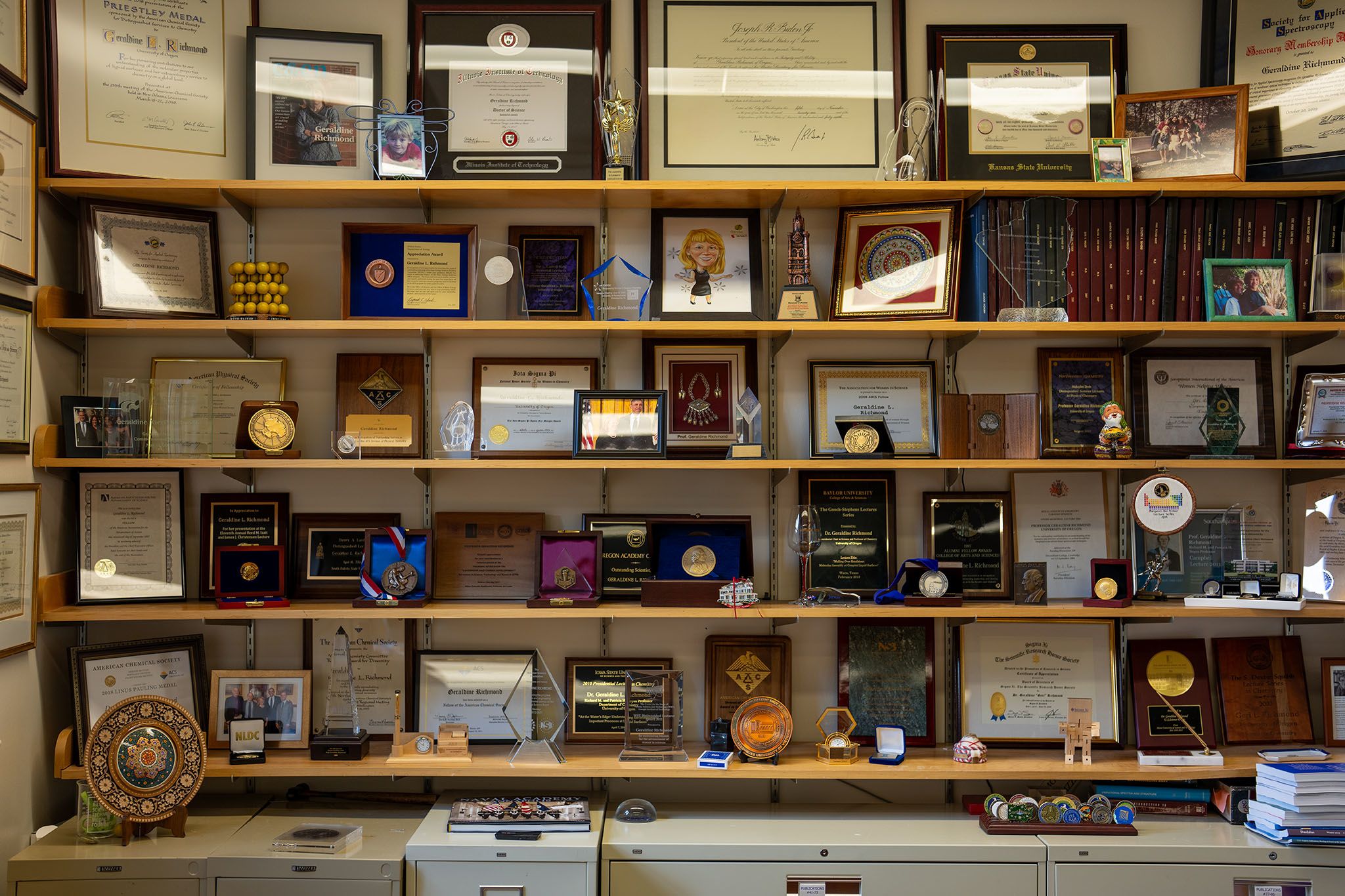 Awards and honors on the shelves of Richmond's office