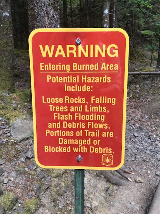 Sign warning of landslide danger in wildfire zone