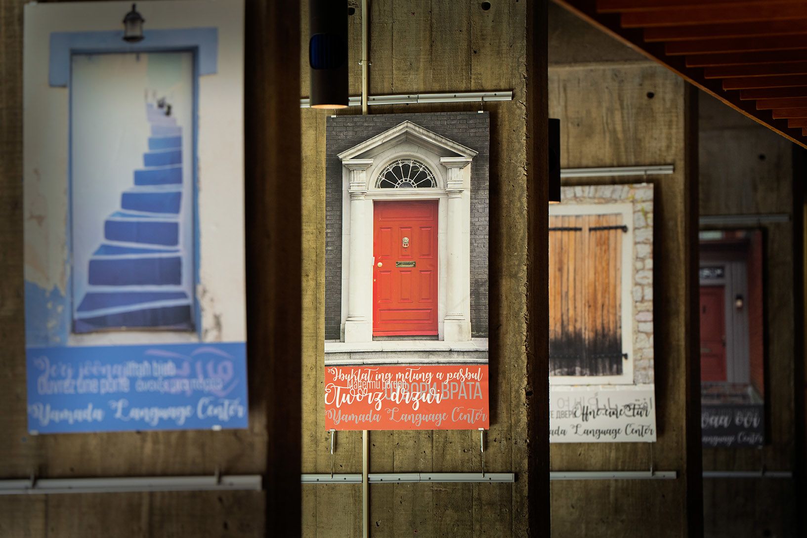 A series of panels show programs offered in the Yamada Language Center