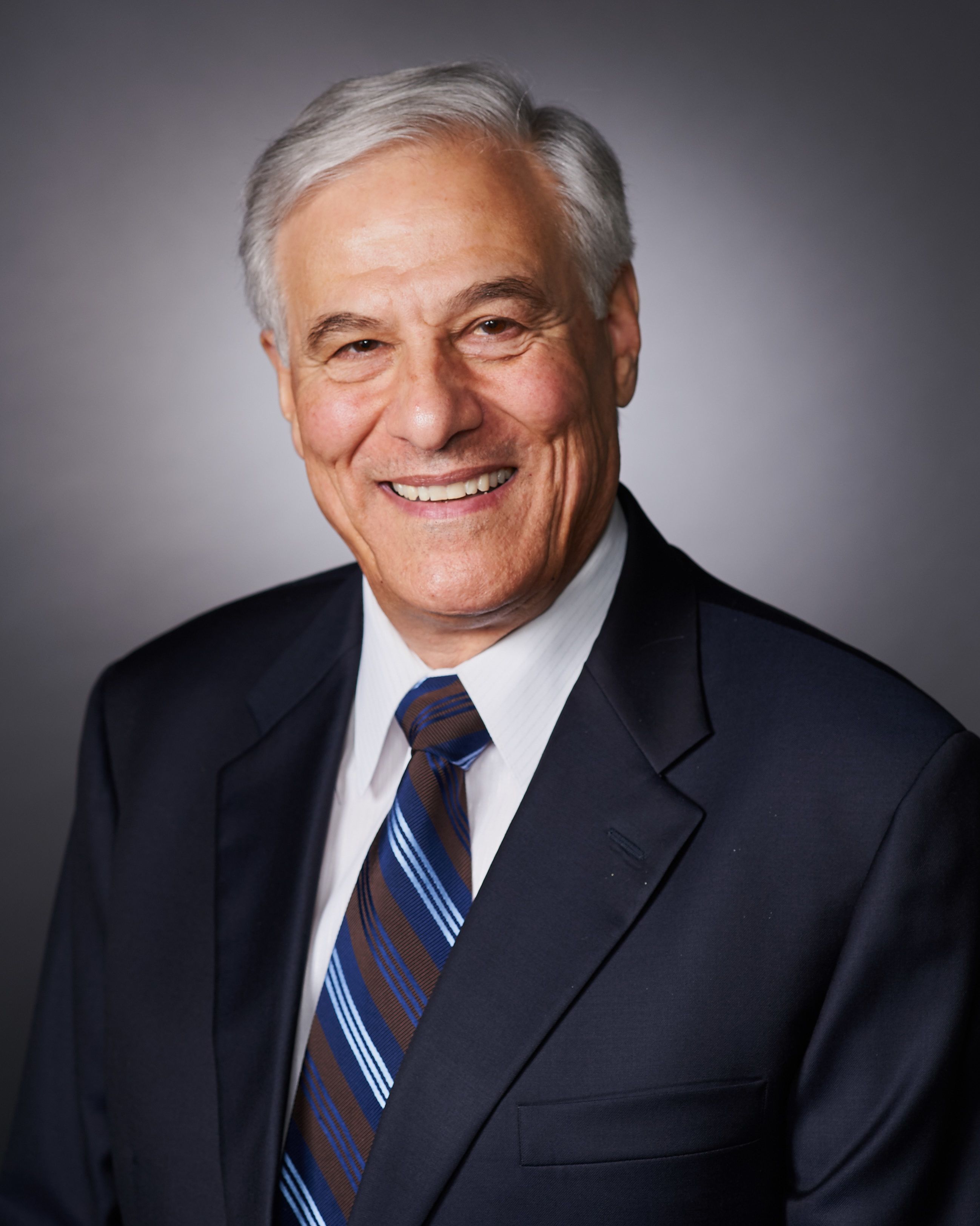 a headshot of Dr. Richard Abraham