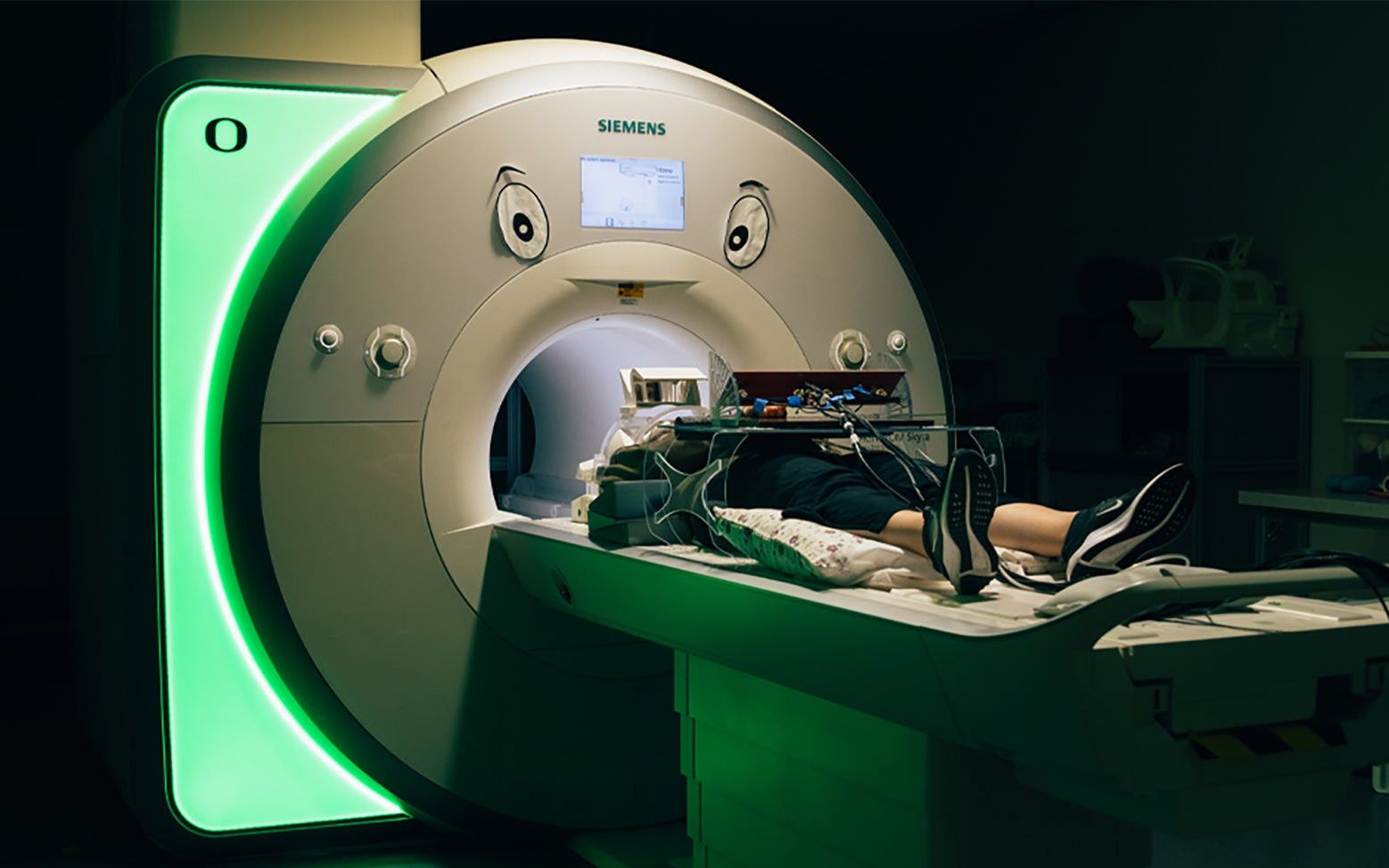 A person being moved into and MRI machine