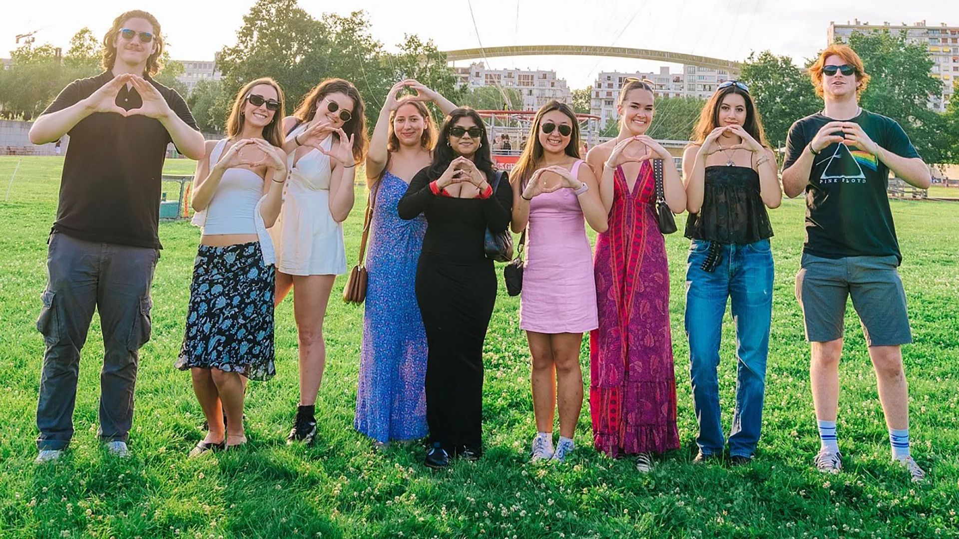 Study abroad students throwing the O in Paris
