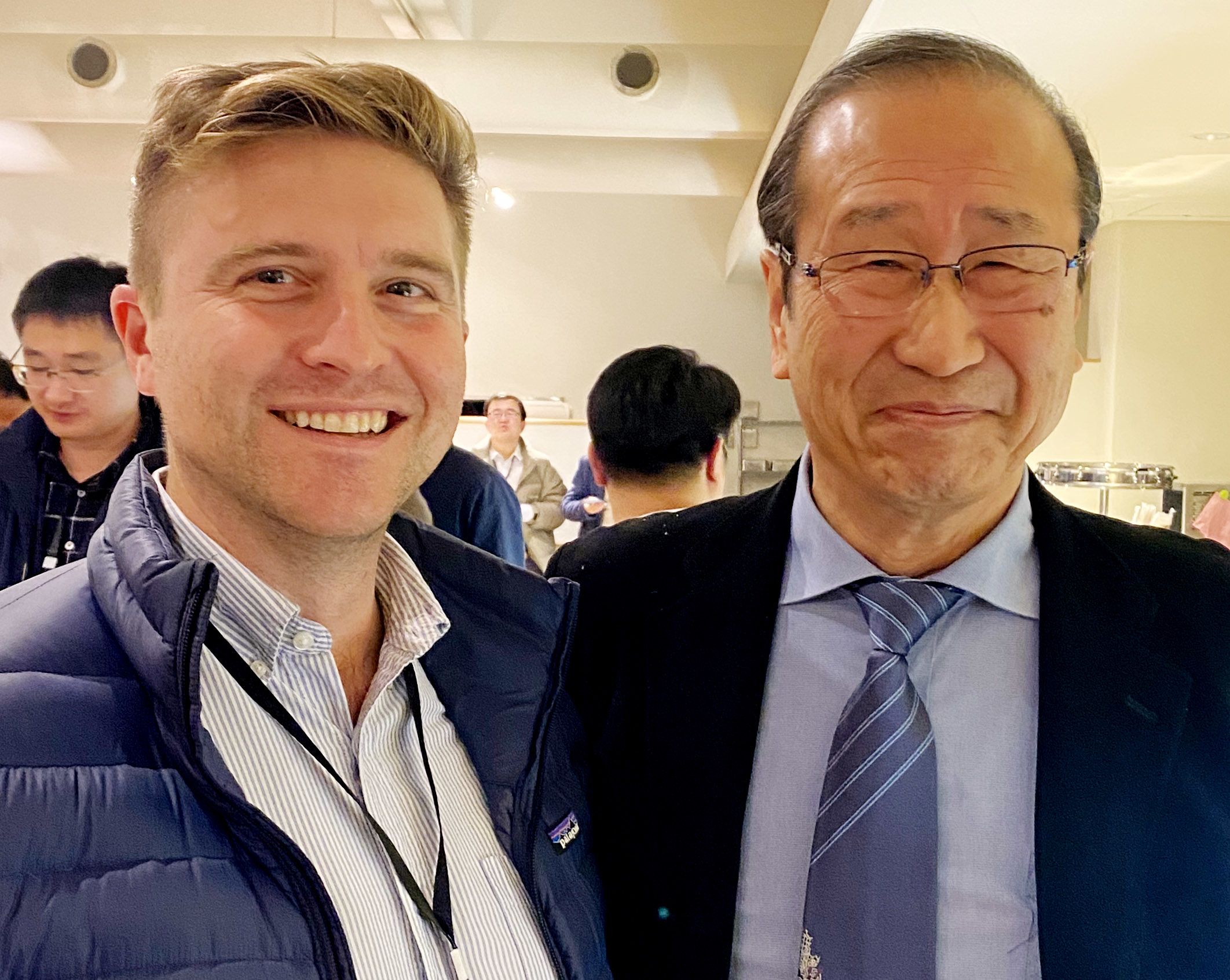 Two people posing for camera