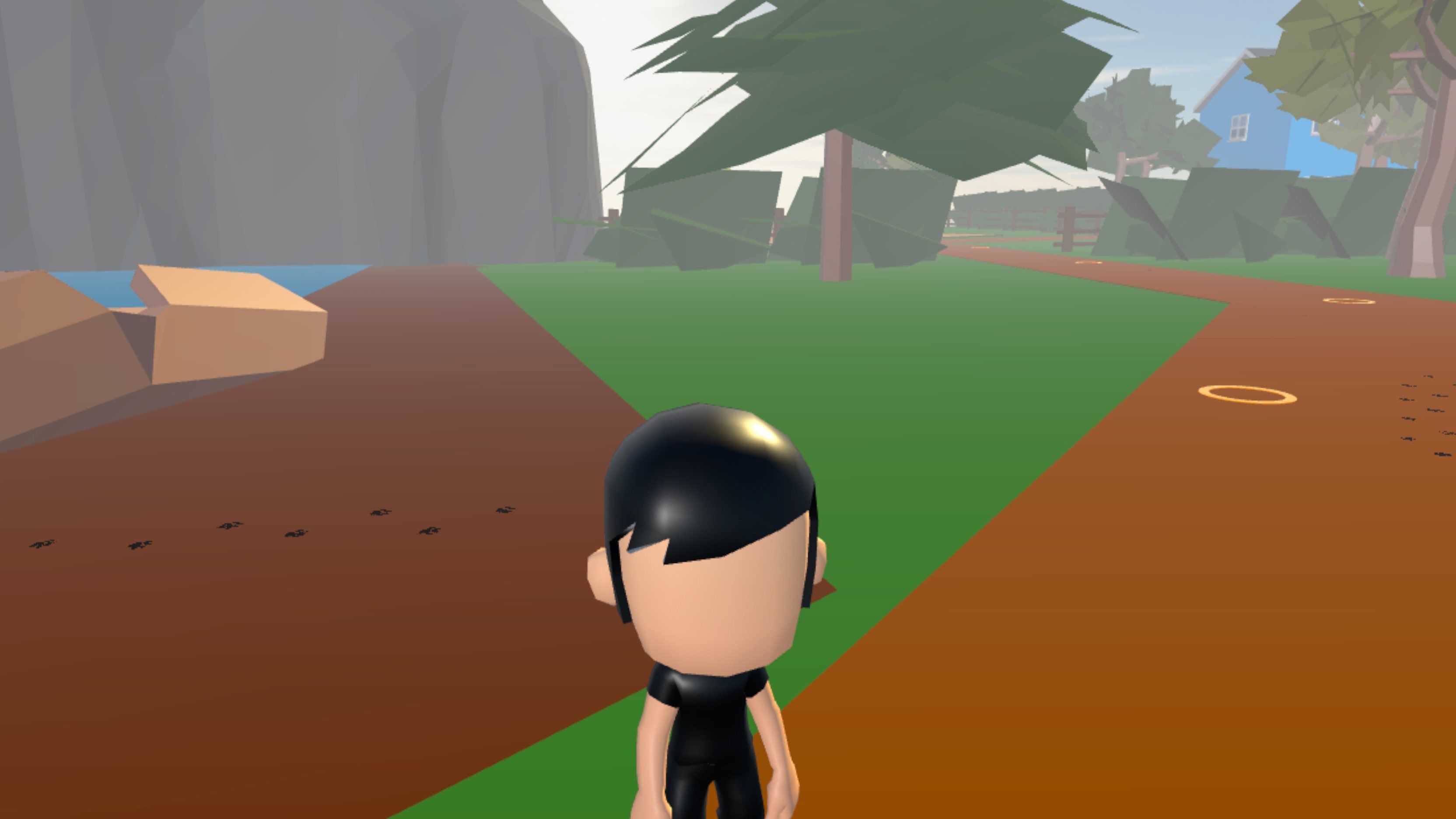 A child-sized video game character with black hair stands on pathway in a low-polygon outdoor environment